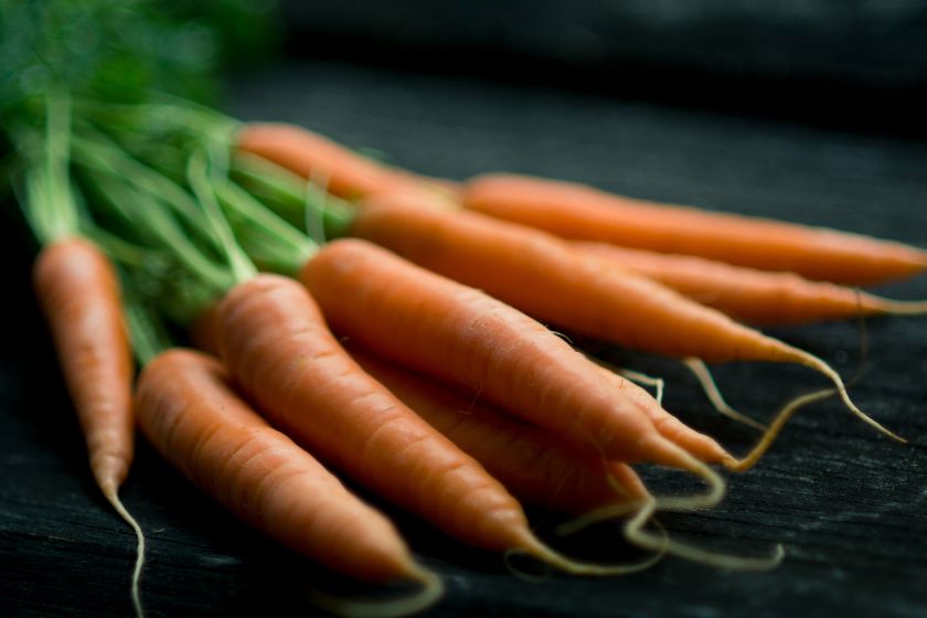 A bunch of raw carrots.